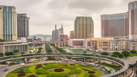 china day light famous macau casino hotel center traffic circle panorama 4k time lapse