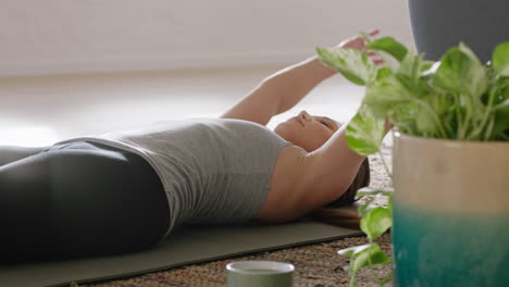 beautiful-yoga-woman-exercising-healthy-lifestyle-stretching-flexible-body-enjoying-workout-in-studio-training-breathing-exercise-at-sunrise