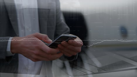 animation of data processing over caucasian businessman using smartphone