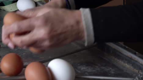 close-up sorting eggs for packaging at a small farm