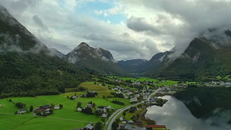 aerial over syvde on a cloudy day, vanylven municipality, norway