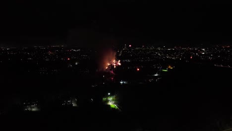 Aerial-shot-of-fireworks-being-set-off-on-bonfire-night-in-the-UK