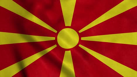 the national flag of macedonia is flying in the wind. 4k