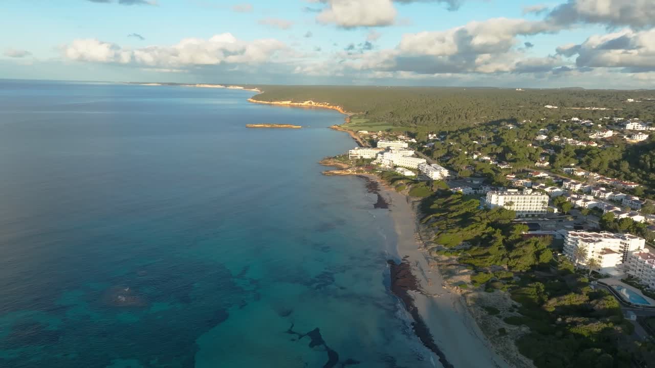 Santo Tomas beach Menorca island Spain holiday destination sandy shore aerial drone