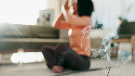 woman meditating with incense