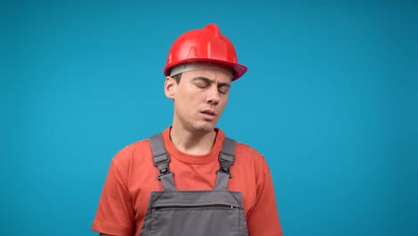 A construction worker in a hard hat displaying various emotions against a blue background.