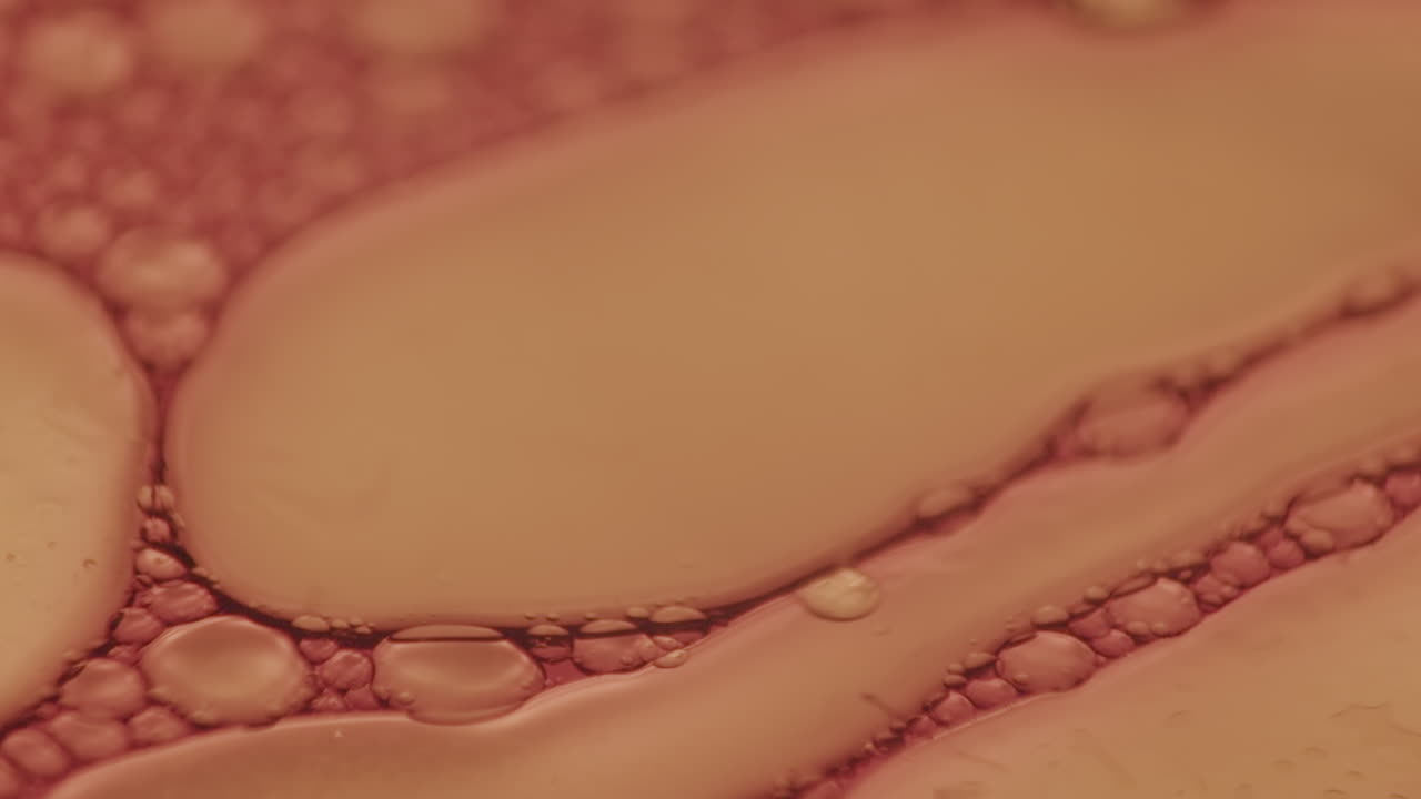 기포 및 기타 모양을 형성하는 점성 액체의 추상 매크로 샷