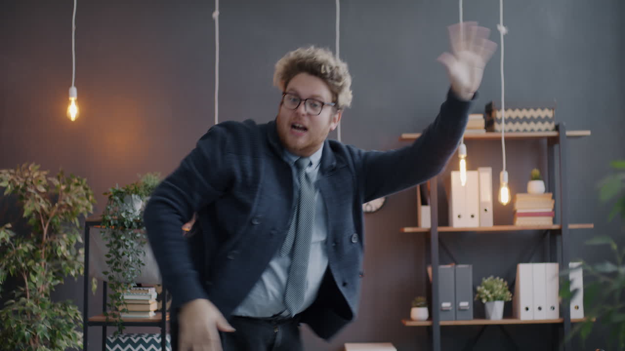 Man Dancing in Office