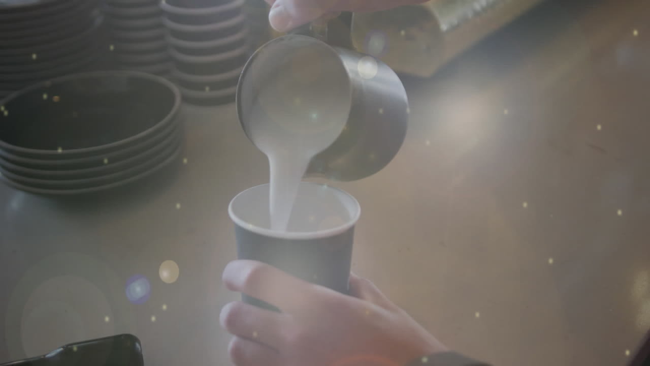 카페에서 커피를 만드는 사람 위에 빛의 반점의 애니메이션