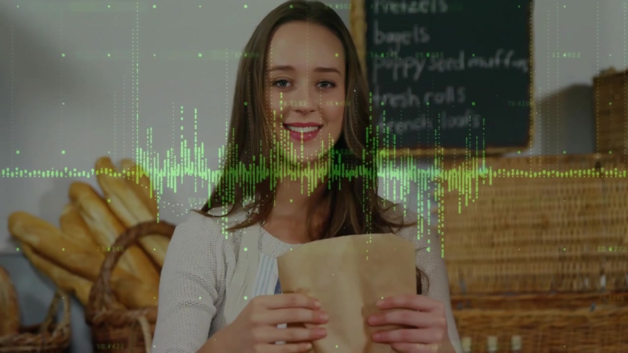 Female bakery clerk picking tongs, selecting plain bagel and placing into paper bag for handoff