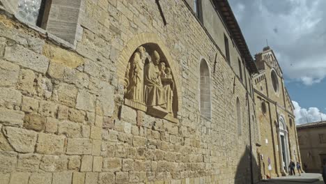 detail on the wall outside of the volterra cathedral [ santa maria assunta ], volterra, province of perugia, italy