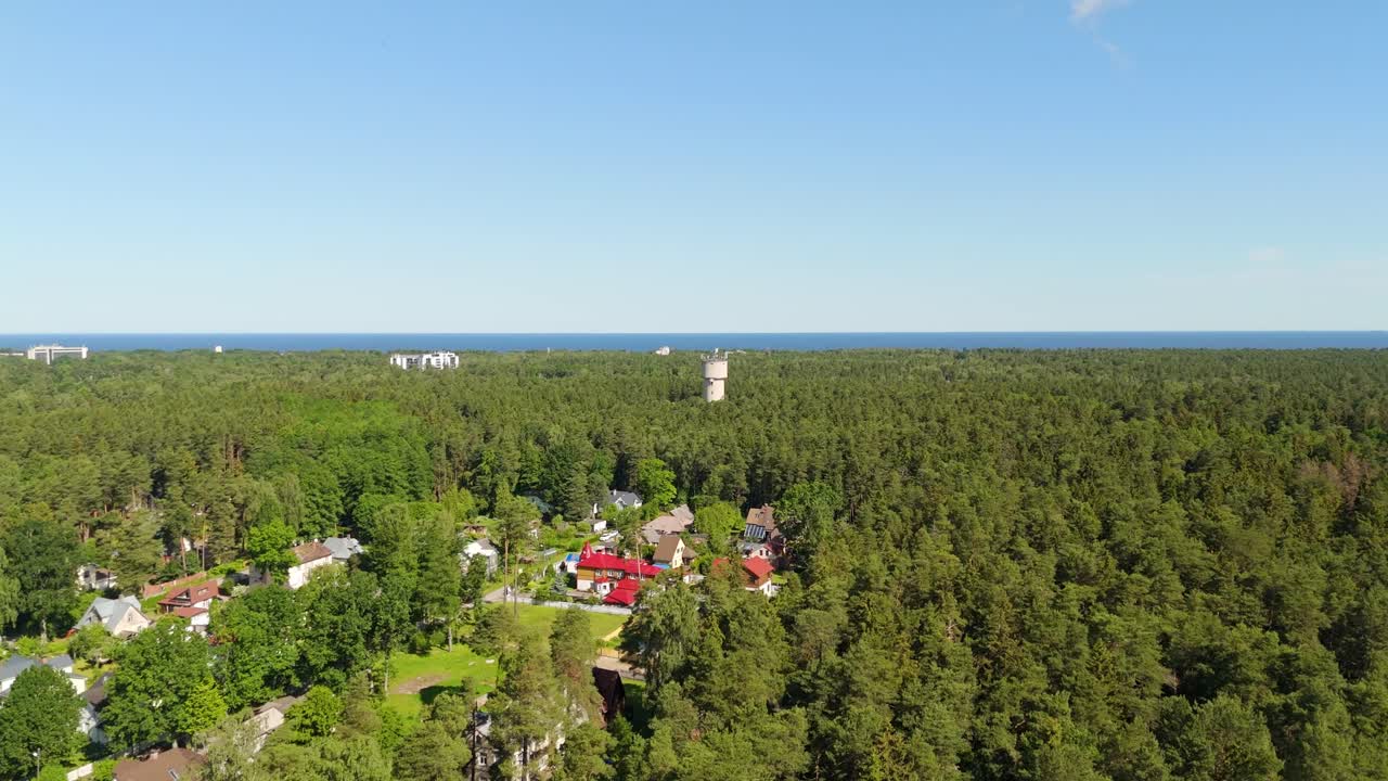 Drone view over Jurmala Latvia forested area with homes