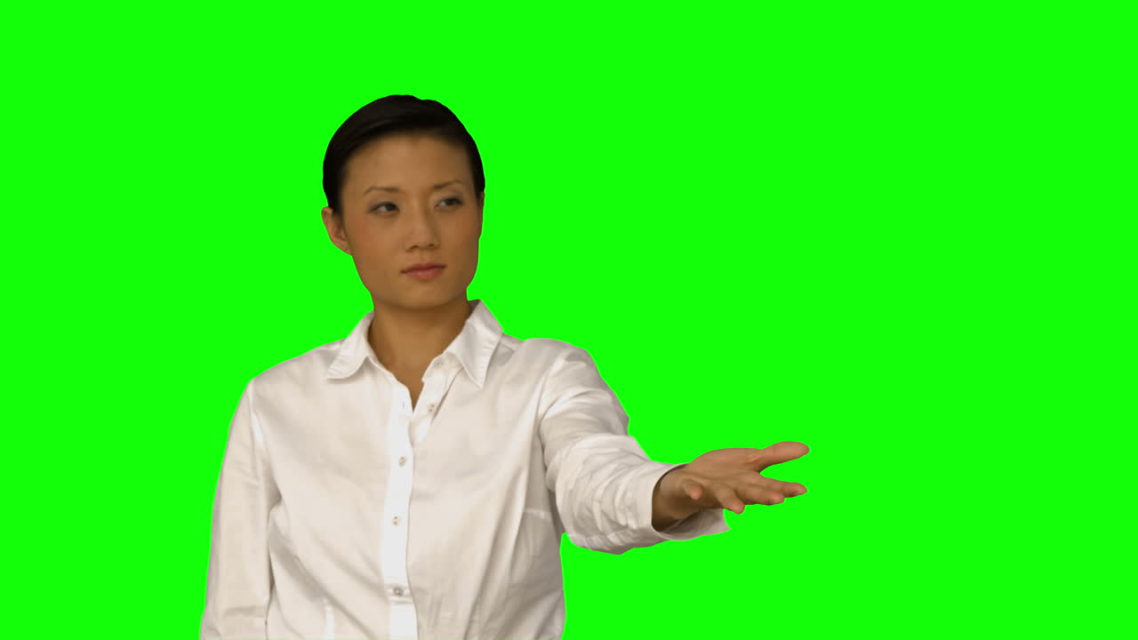 Businesswoman presenting with her hand