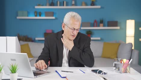 home office worker man suffering from sore throat.