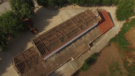 panoramic view of wooden frame house under construction roof beams