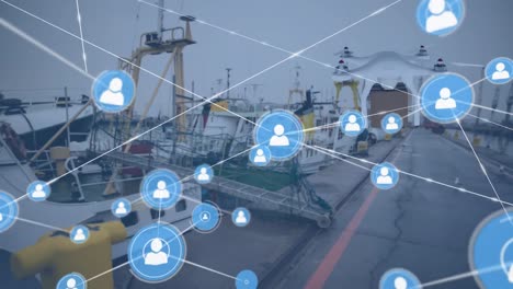 animation of network of connections with icons over drone with parcel and landscape
