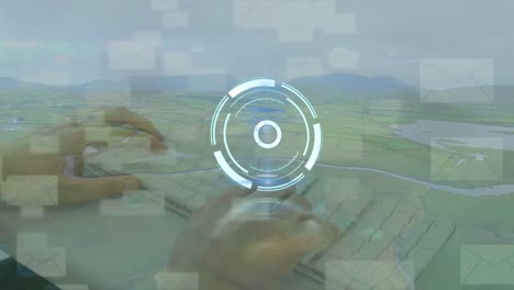 animation of scope scanning and envelope icons over hands typing on keyboard and landscape