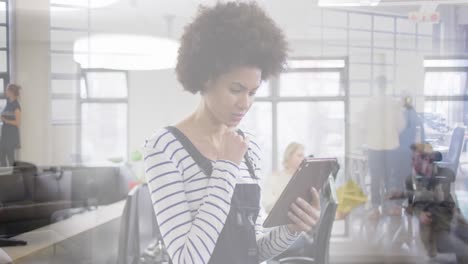 Animation-of-biracial-businesswoman-with-tablet-over-cityscape