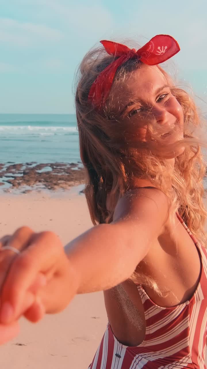 Young couple enjoys a romantic escape by the ocean under a clear sky
