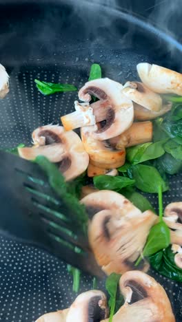 cooking mushrooms and spinach