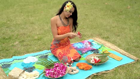 young woman preparing garland in the garden 4k