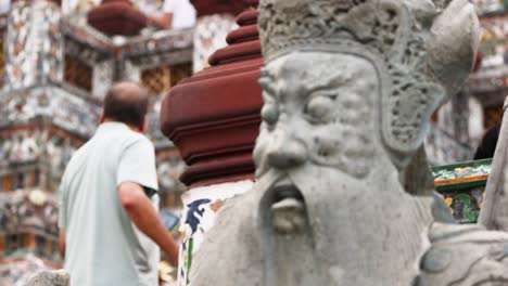 stone carving of a figure in a temple