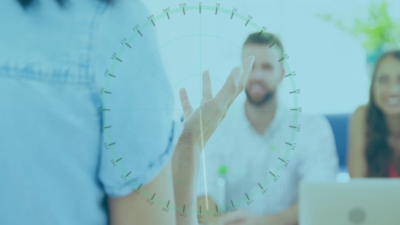 Gesturing with hand, person using digital compass animation in office meeting