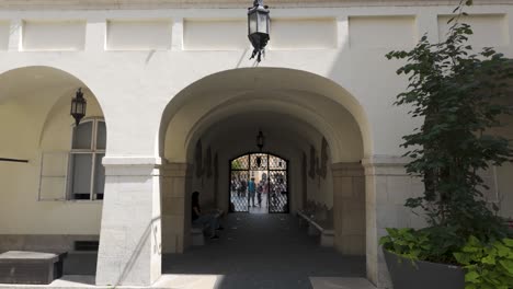 elegant arches of the old town hall in bratislava, slovakia under a sunny sky