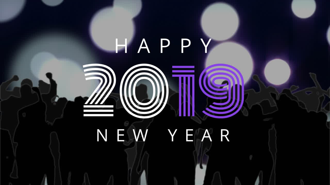 Silhouette of people dancing against 2019 New Year Sign 4k