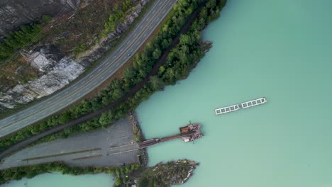 Aerial-topdown-of-Squamish-coastline-and-Trans-Canada-Highway-and-forest,-Squamish,-BC,-Canada