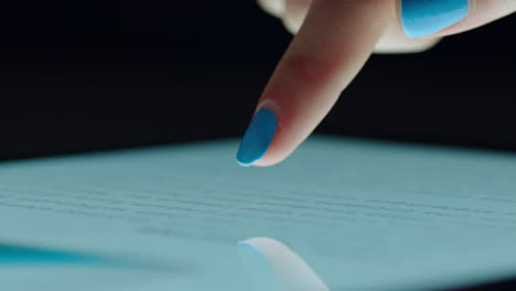 close up hand business woman using digital tablet computer browsing corporate marketing research project document on mobile touchscreen device screen