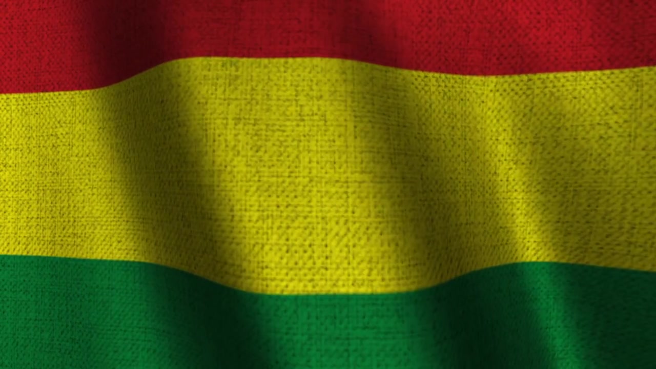 Fundo com textura de tecido da bandeira da Bolívia tremulando.