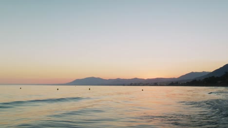 Dawn-at-the-coastline-of-Marbella,-Spain