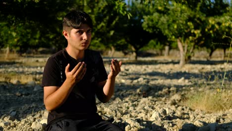 farmer praying in garden