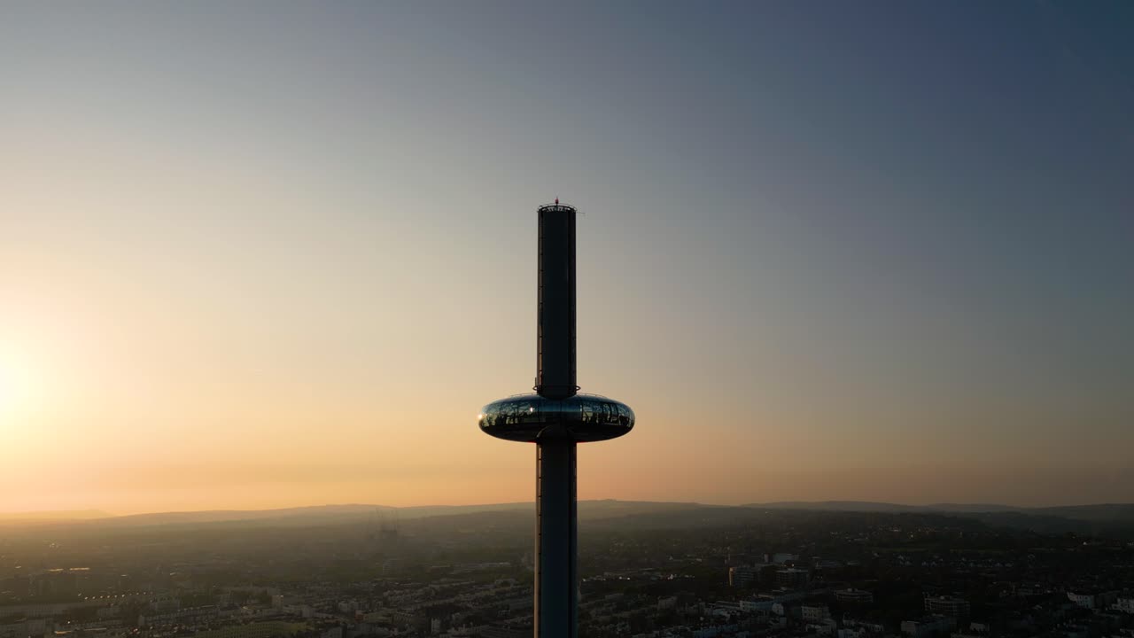 Close Up of Brighton i360 Tower with Colorful Sunset Gradient Sky and Skyline Silhouette