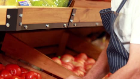 senior worker in the supermarket