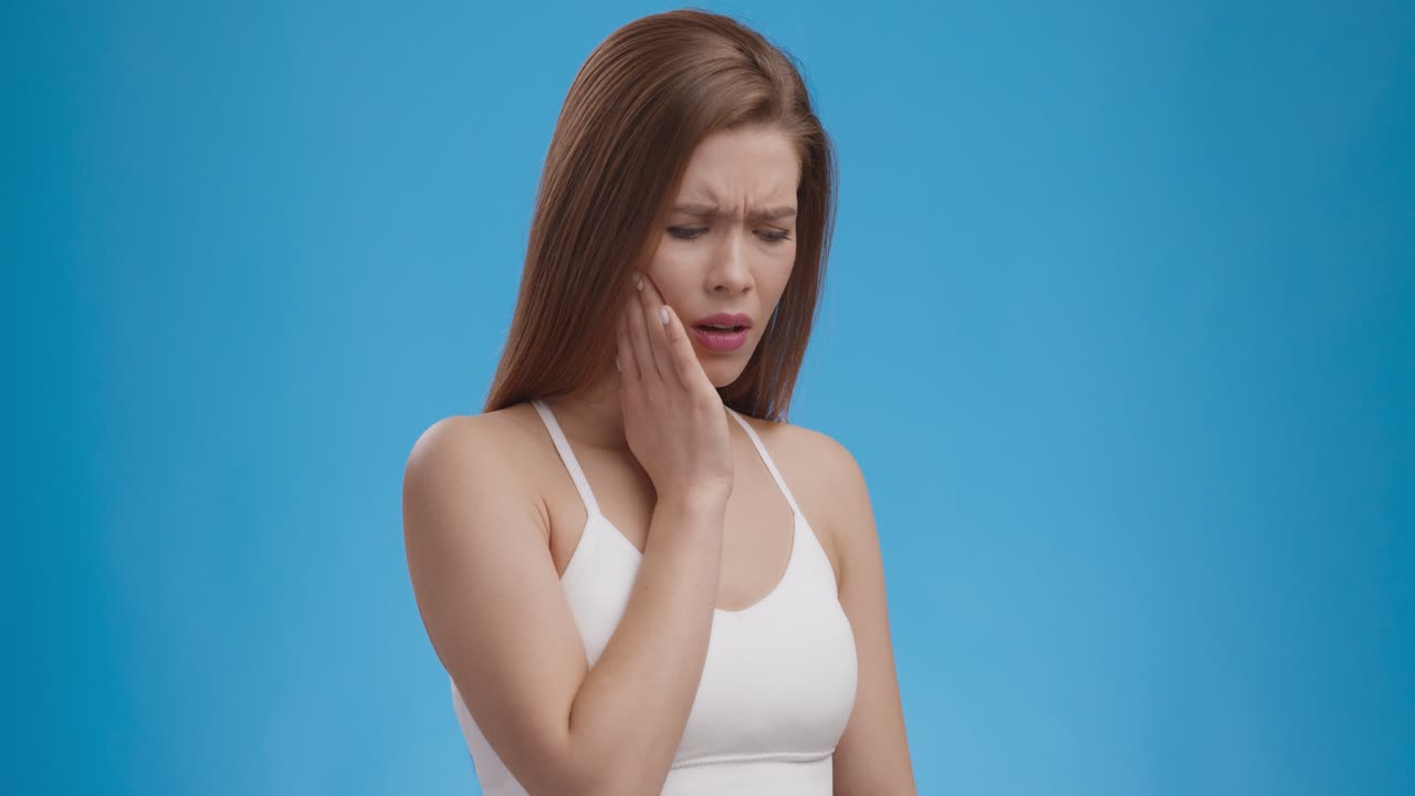 Woman Experiencing Toothache
