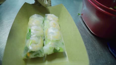 fresh sushi prepared for takeout in an asian restaurant