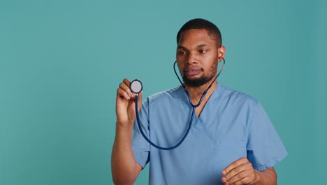 nurse using stethoscope on patient during medical exam