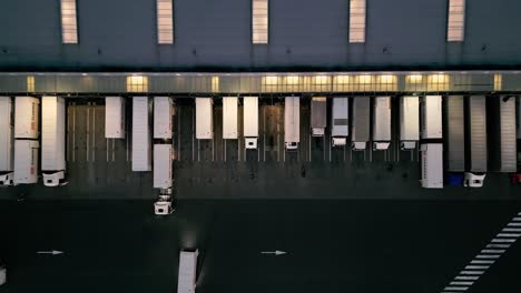 night aerial view of a warehouse of goods for online stores