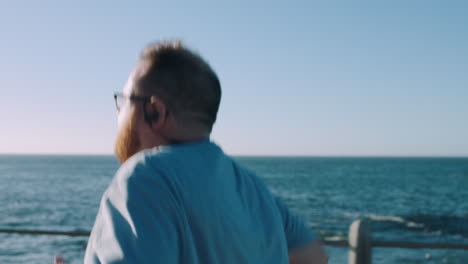 fitness, weightloss and man running by ocean