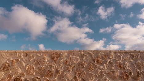stone wall under a cloudy sky