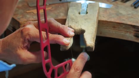 Craftswoman-working-in-workshop