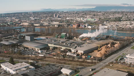 aerial flying back from a pulp mill along the fraser river in vancouver, bc