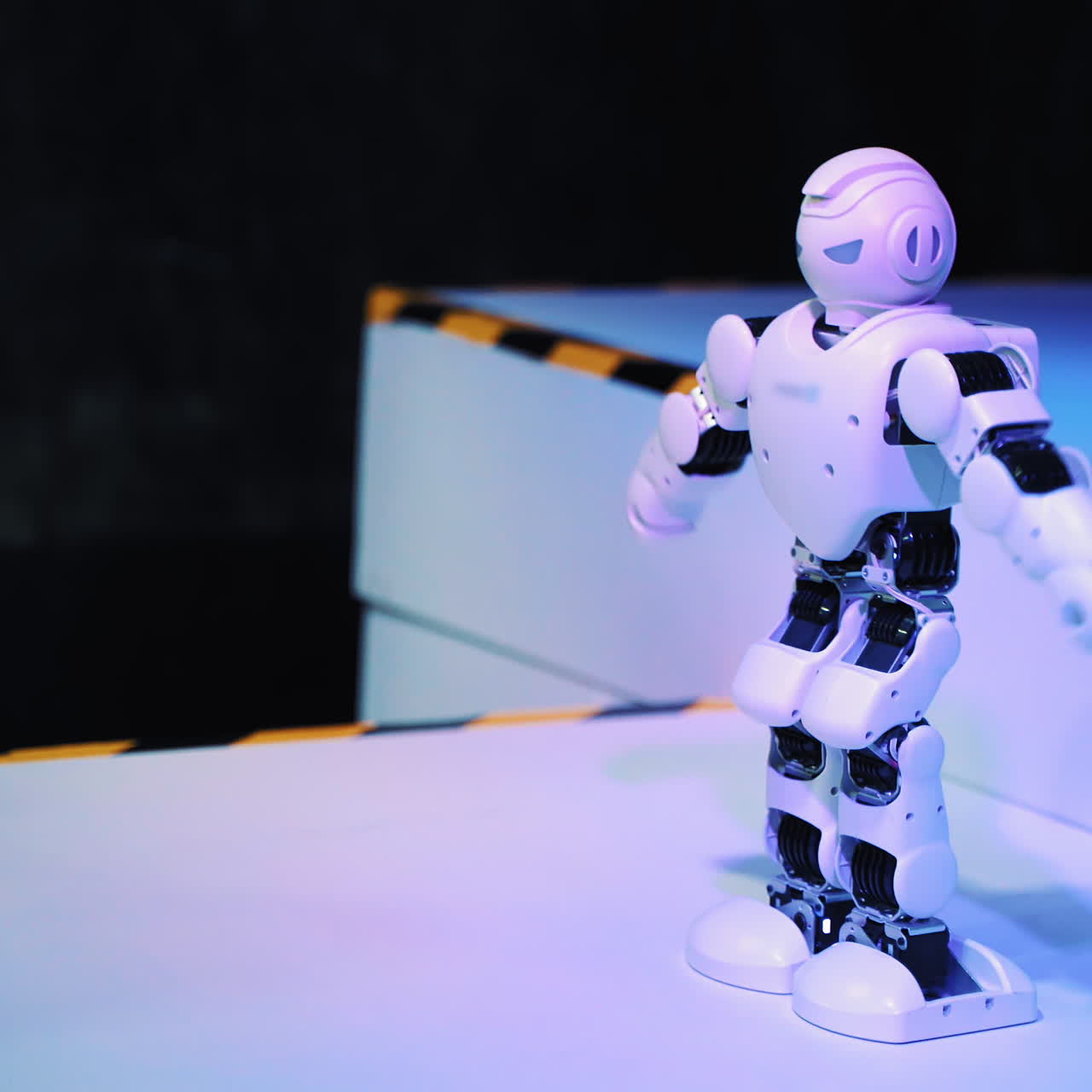 Dancing Robot humanoid. Artificial Intelligence dance at exhibition pavilion showroom. Smart Robot