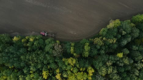 combine harvester on field at harvest.aerial view of agricultural land with harvester.combine harvesting wheat.