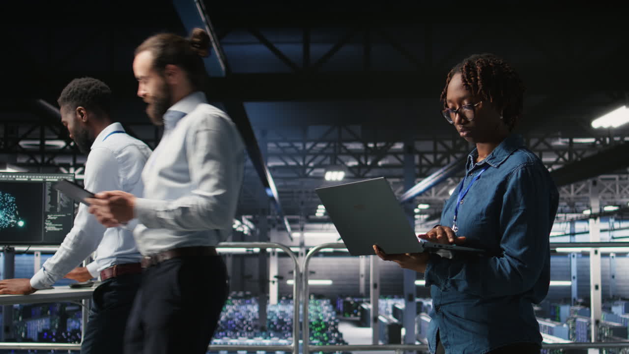 Portrait of joyful woman in data center monitoring neural network visualization
