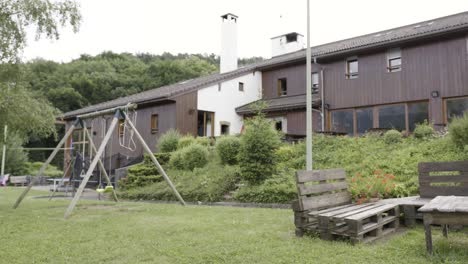 exterior of a community center with a playground