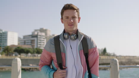 portrait of confident teenager smiling relaxed  on sunny beachfront