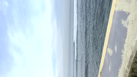 vertical panning view of the cascais sea in portugal